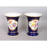 A GOOD 19TH CENTURY MEISSEN BLUE GROUND TRUMPET VASE, painted with a panel of flowers. Cross