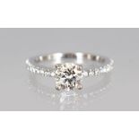 A VERY GOOD 18CT WHITE GOLD DIAMOND RING of 1.2cts, colour H, clarity VS.