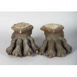 A PAIR OF EARLY STONE LION PAW FEET. 6ins long.