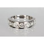 AN 18CT WHITE GOLD SEVEN STONE DIAMOND RING OF 1.3CTS.