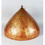 A GOOD EASTERN RED LACQUER AND GILT DECORATED DOME SHAPE COVER, decorated with animals in a