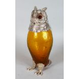 A GOOD LARGE OWL CLARET JUG with plated head and feet.