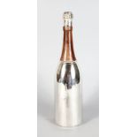 A CHAMPAGNE BOTTLE COCKTAIL SHAKER.