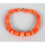 A VERY GOOD SET OF CORAL BEADS of twenty-seven beads.