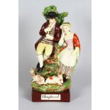 A 19TH CENTURY PEARLWARE GROUP, CIRCA. 1820, "SHEPHERD" AND YOUNG LADY with two sheep. Inscribed "
