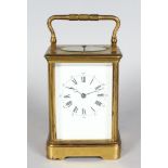 A 19TH CENTURY FRENCH BRASS REPEATER CARRIAGE CLOCK. 5.5ins high.