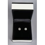 A PAIR OF 14CT WHITE GOLD DIAMOND STUD EARRINGS of 1.46cts, colour J, clarity Si.