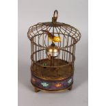 A BIRD CAGE CLOCK. 8ins high.