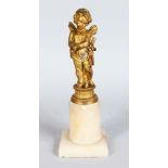 A 19TH CENTURY GILDED BRONZE CUPID on an alabaster base. 10ins high.