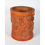 A CHINESE CARVED BAMBOO BRUSH POT. 7ins high.