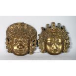 A PAIR OF INDIAN MASKS.