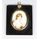 A GOOD OVAL PORTRAIT MINIATURE OF MRS LEDGE (NEE THOROLD), head and shoulders 3.5ins x 2.75ins,