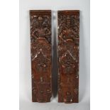 A PAIR OF CARVED WOOD ELIZABETHAN PANELS, carved with figures. 18ins long.