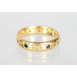 AN 18CT GOLD, DIAMOND AND SAPPHIRE RING.