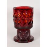 A HEAVY CUT GLASS RUSSIAN GOBLET. 7.5ins high.