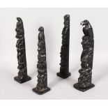 A COLLECTION OF FOUR 19TH/20TH CENTURY HAIDA STYLE ARGILLITE TOTEM POLE CARVINGS, IN THE MANNER OF