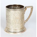 A VICTORIAN CHASED MUG. London 1880. Makers: T.B. & J.H.