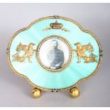 A GOOD FABERGE MODEL SILVER GILT AND GREEN GUILLOCHE ENAMEL PHOTOGRAPH FRAME, the border inset