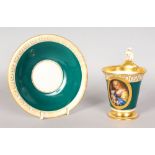 A LOVELY BERLIN CUP AND SAUCER, rose and gilt, painted with an oval of a young girl with a lamb.