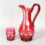 A GOOD VICTORIAN RUBY CLARET JUG AND BEAKER.