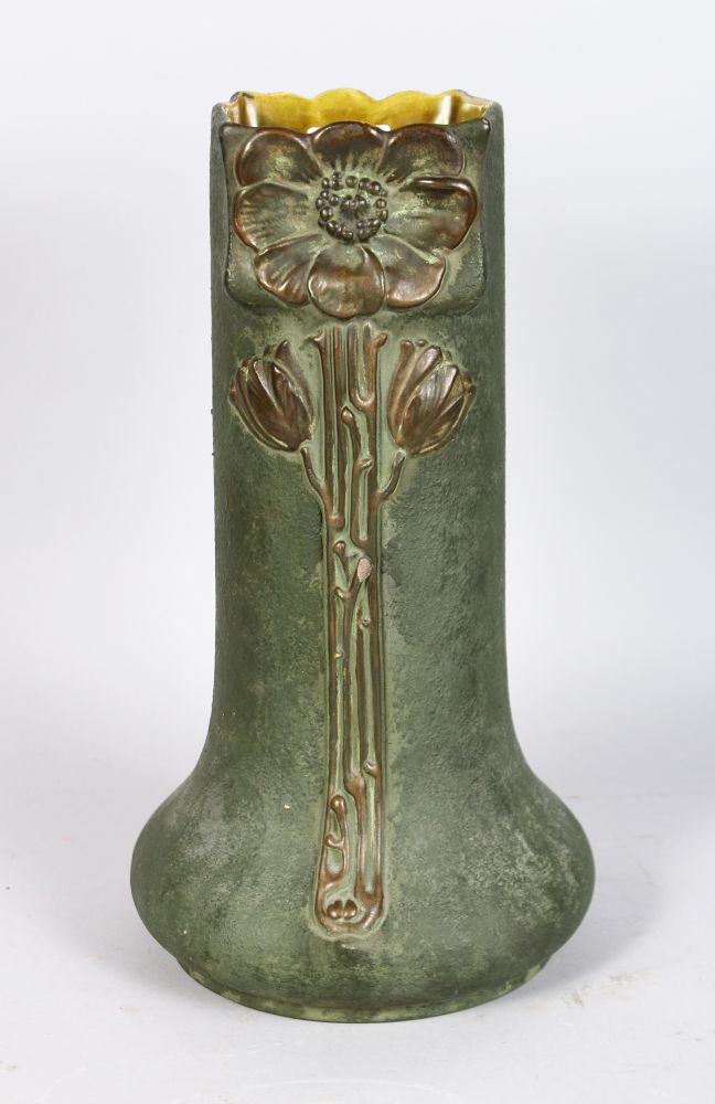 A JULIUS DRESSLER POTTERY VASE, green matt glaze, with moulded floral decoration. Impressed marks to