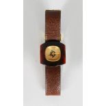 A VERY RARE 1930'S BOUCHERON TORTOISESHELL & 18K GOLD WATCH with leather strap, in a Boucheron