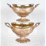 A GOOD PAIR OF GEORGE III TWO-HANDLED SAUCE TUREENS with garlands and swags and gadrooned rim.