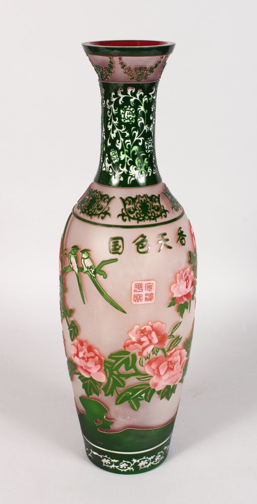 A LARGE PEKING GLASS TYPE VASE of Chinese design with birds and calligraphy. 17ins high.