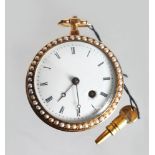 A GOLD AND ENAMEL FOB WATCH, with white enamel dial, Roman numerals, the bezels set with seed