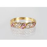 A 9CT GOLD, PINK SAPPHIRE AND DIAMOND RING.