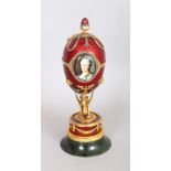 A VERY GOOD FABERGE MODEL SILVER GILT, DIAMOND AND GUILLOCHE ENAMEL EGG, with acorn finial, the