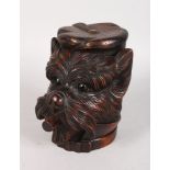 A BLACK FOREST CARVED WOOD DOG'S HEAD with hinged top and smoking a cigar. 7ins high.