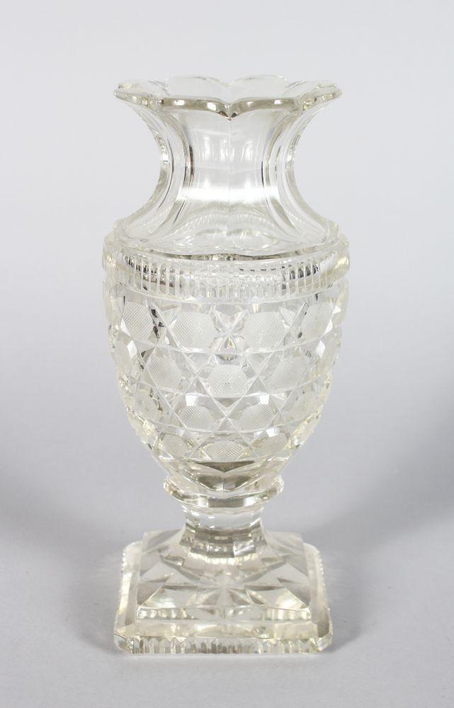 A DEEP CUT FLOWER VASE, on a square star cut base 8.5in high