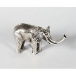 A SILVER NOVELTY ELEPHANT.