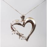 A WHITE GOLD DIAMOND SET HEART SHAPED PENDANT NECKLACE.