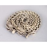 A CHINESE SILVER NECKLACE, the clasp modelled as dragons. 2ft 3ins long.