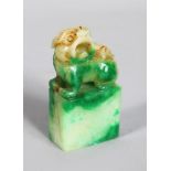 A CHINESE JADEITE DOG OF FOE SEAL. 2.5ins high.