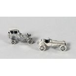 TWO NOVELTY SILVER CARS.