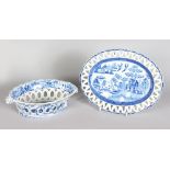 A SPODE BLUE AND WHITE PIERCED OVAL CHESTNUT BASKET AND STAND. 9ins wide.