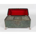 A RARE GEORGE III SHAGREEN THREE DIVISION TEA CADDY, with silver mounts and claw and ball feet.