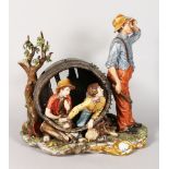 A SUPERB LARGE CAPODIMONTE PORCELAIN GROUP, two boys inside a barrel and man standing at the side.