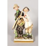 A CAPODIMONTE PORCELAIN GROUP, two men going fishing. Signed. 10.5ins high.