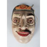 A POLYCHROME CARVED WOODEN DANCE MASK (TOPENG) dramatically modelled with bulging eyes, moustache