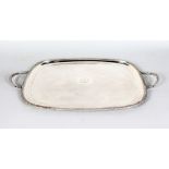 AN OLD SHEFFIELD PLATE TWO HANDLED RECTANGULAR TEA TRAY, with gadrooned edge, "SINCLAIR CLAN MOTTO