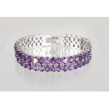 A SILVER AMETHYST DOUBLE ROW LINE BRACELET.