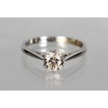 AN 18CT WHITE GOLD SOLITAIRE DIAMOND RING of 70 points, colour H, clarity Si.