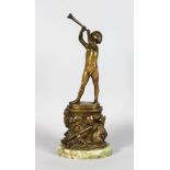 BRUNO ZACH (1891-1945) AUSTRIAN, "GOLDEN AGE" a young boy standing on a pedestal blowing a horn,