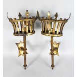AN UNUSUAL PAIR OF 20TH CENTURY WROUGHT IRON WALL SCONCES, formed as medieval braziers. 2ft 1ins