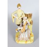 A PORCELAIN SPILL VASE MODELLED AS RUSSIAN LOVERS. 9ins high.