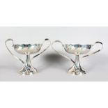 A PAIR OF SILVER PLATED ART NOUVEAU STYLE PIQUE ENAMEL TWO HANDLED TAZZA.